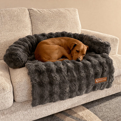 Luxurious faux-fur sofa bed for dogs with a dog resting on it
