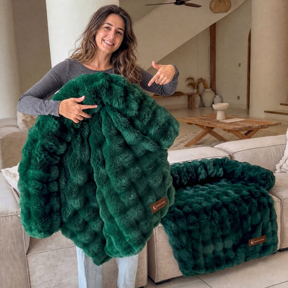 Luxurious faux-fur sofa bed for dogs with a dog resting on it